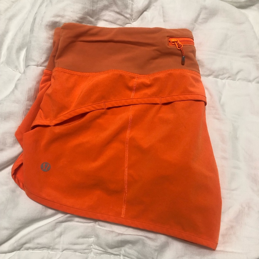 Size 8 orange lululemon speed shorts 2.5” seam